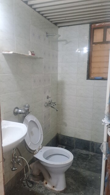 Bathroom in 2 BHK Apartment at Arjun CHS Vasant Vihar, Vasant Vihar – for Rent