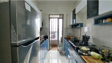 Kitchen in 2 BHK Apartment at Kalpataru Paramount, Kapur Bawdi – for Rent