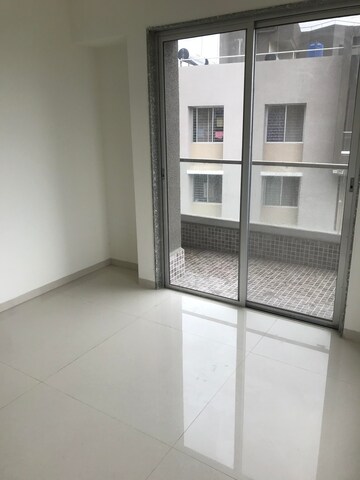 Room in 2 BHK Apartment at Axis Paradigm Whistling Meadows, Paud Road – for Sale