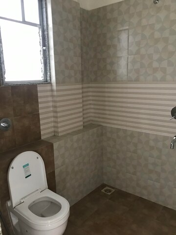 Bathroom in 2 BHK Apartment at Axis Paradigm Whistling Meadows, Paud Road – for Sale
