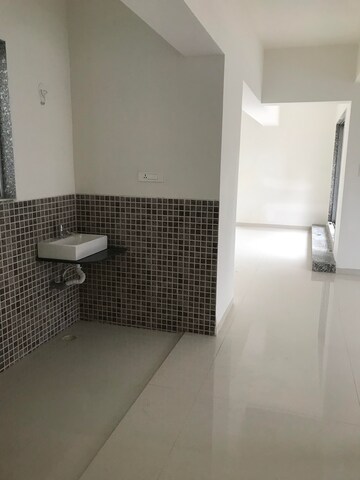 Bathroom in 2 BHK Apartment at Axis Paradigm Whistling Meadows, Paud Road – for Sale
