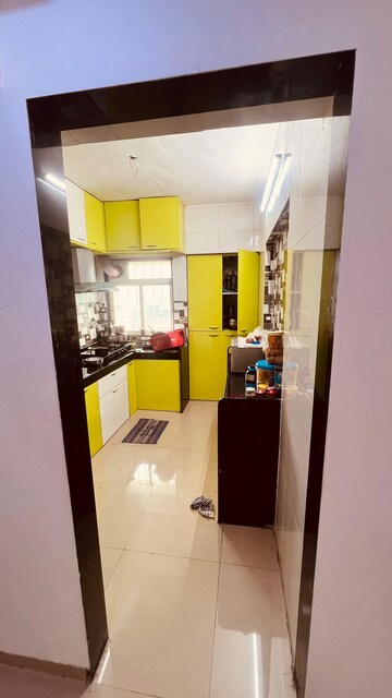 Kitchen in 2 BHK Apartment at Gaurav Purushottam Nayan Apartment, Haware City – for Sale