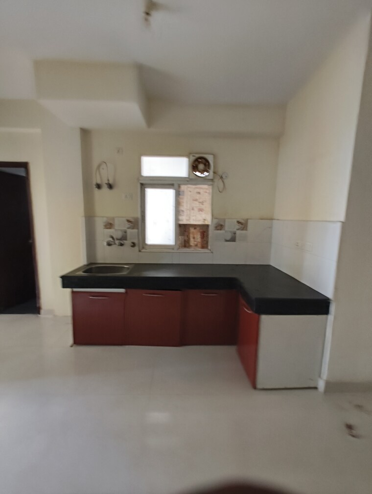 Kitchen, signature-global-the-roselia 2 Bedroom 670 Sq.Ft. Apartment In Sector 95a Gurgaon 9171570