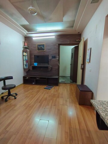 Living Room in Studio Apartment at Royal Palms, Goregaon East – for Rent