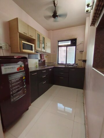 Kitchen in Studio Apartment at Royal Palms, Goregaon East – for Rent