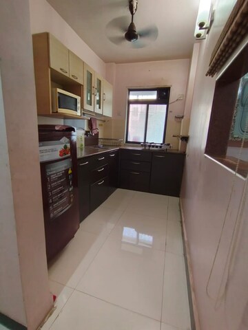 Kitchen in Studio Apartment at Royal Palms, Goregaon East – for Rent
