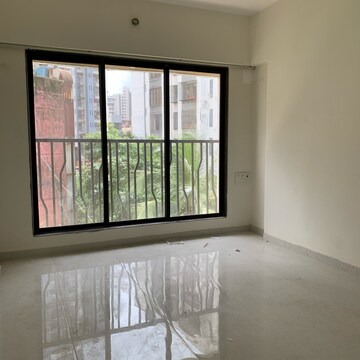 Room in 2 BHK Apartment at Kamla Om Hansa CHS, Roshan Nagar – for Rent