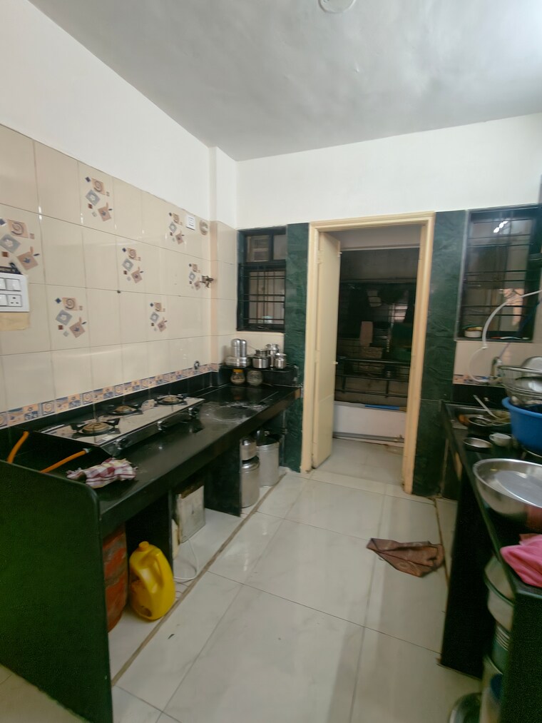Kitchen, gk-royale-rahadki-greens 2 Bedroom 586 Sq.Ft. Apartment In Rahatani Pune 9171756
