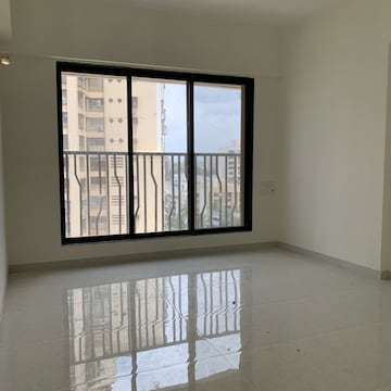 Room in 2 BHK Apartment at Kamla Om Hansa CHS, Roshan Nagar – for Rent