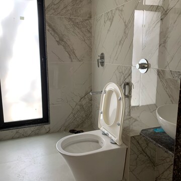 Bathroom in 2 BHK Apartment at Kamla Om Hansa CHS, Roshan Nagar – for Rent