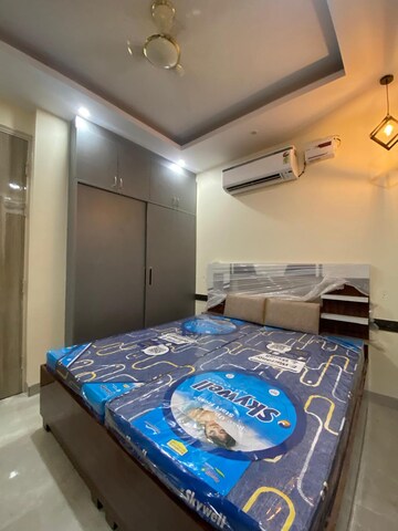 Bedroom in 4 BHK Builder Floor at Ansal API Esencia, Sector 67 – for Rent