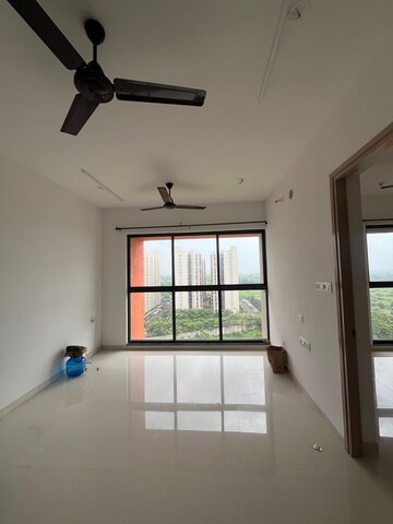Living Room in 1 BHK Apartment at Lodha Palava Downtown Dombivli East, Dombivli East – for Rent