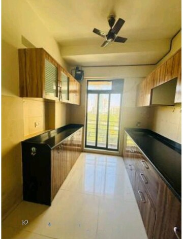 Kitchen in 2 BHK Apartment at Vijay Residency Phase III, Kavesar – for Sale