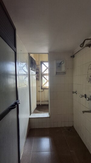 Kitchen in 1 BHK Apartment at Thakur Ganpati Tower, Kandivali East – for Sale