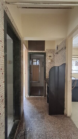 Kitchen in 1 BHK Apartment at Thakur Ganpati Tower, Kandivali East – for Sale