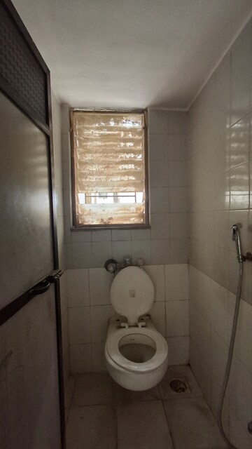 Kitchen in 1 BHK Apartment at Thakur Ganpati Tower, Kandivali East – for Sale