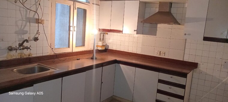 Kitchen, greater kailash ii 3 Bedroom 250 Sq.Yd. Builder Floor In Greater Kailash ii Delhi 9172157