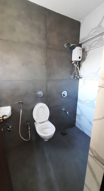 Bathroom in 1 BHK Apartment at Raunak Unnathi Woods Phase 7 A And B, Ghodbunder Road – for Rent