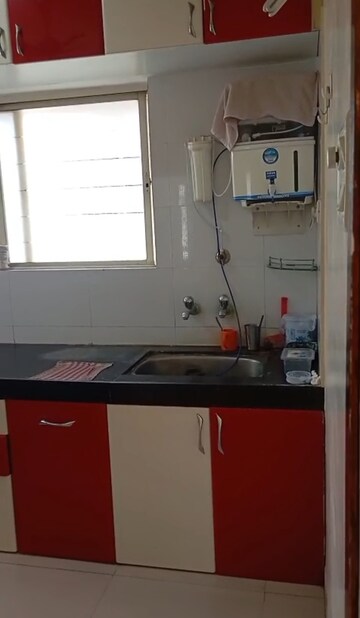 Kitchen in 2 BHK Apartment at Ganga Alfa Paradise, Wagholi – for Rent