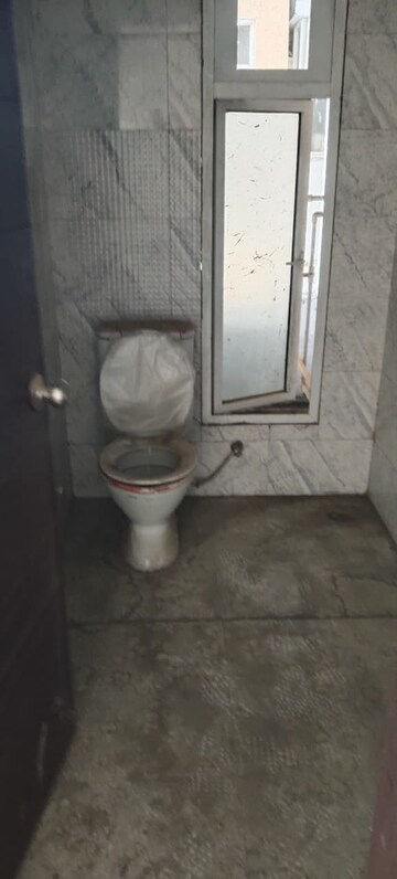 Bathroom in 2 BHK Apartment at Siddharth Vihar – for Sale