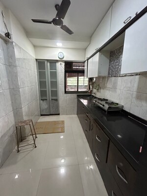 Kitchen in 3 BHK Apartment at Vijay Nagari Annex, Waghbil – for Sale