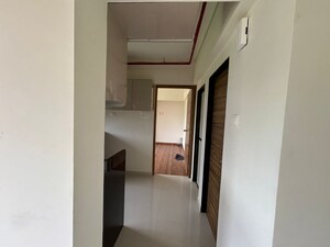 Staircase in 2 BHK Apartment at KM Horizon Exotica, Haware City – for Sale