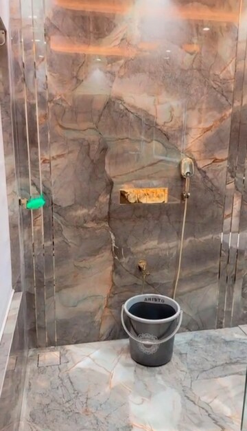 Bathroom in 3 BHK Apartment at Rubberwala Orion, Grant Road East – for Rent