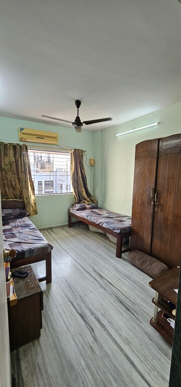 Living Room in 2 BHK Apartment at Gemstar Nazarene Apartments, Malad West – for Sale