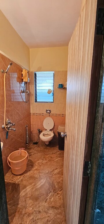 Bathroom in 2 BHK Apartment at Gemstar Nazarene Apartments, Malad West – for Sale