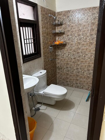 Bathroom in 2 BHK Builder Floor at Wave City, Wave City – for Sale