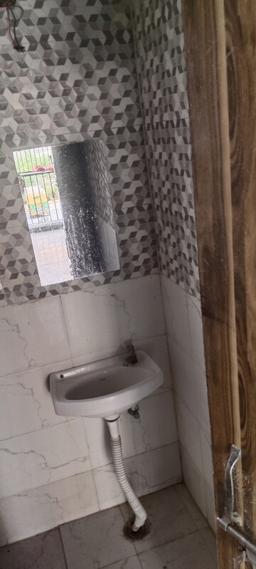 Bathroom in 3 BHK Apartment at Auric City Homes, Sector 82 – for Rent