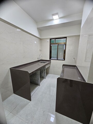 Kitchen in 1 BHK Apartment at Vikroli Indrajeet Niketan CHS, Vikhroli East – for Sale