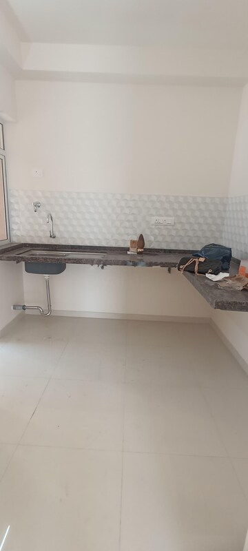 Kitchen in 3 BHK Apartment at Godrej Green Cove, Mahalunge – for Rent