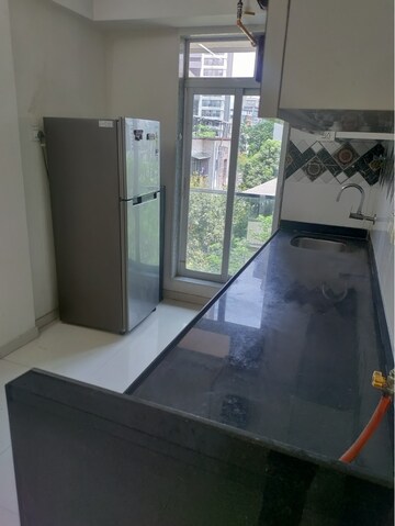 Kitchen in 1 BHK Apartment at Ekdant Anmol Oasis, Naupada – for Sale