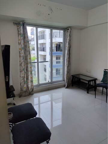 Living Room in 1 BHK Apartment at Ekdant Anmol Oasis, Naupada – for Sale