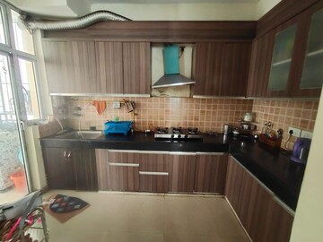 Kitchen in 3 BHK Apartment at Mahagun Mywoods II, Sector 16c Greater Noida – for Rent