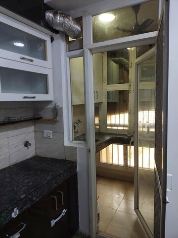 Kitchen in 2.5 BHK Apartment at Ajnara Le Garden, Sector 16b Greater Noida – for Rent