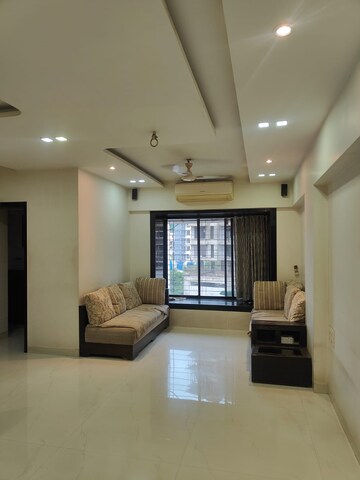 Living Room in 2 BHK Apartment at Ramdev AMI Drashti, Dahisar East – for Rent