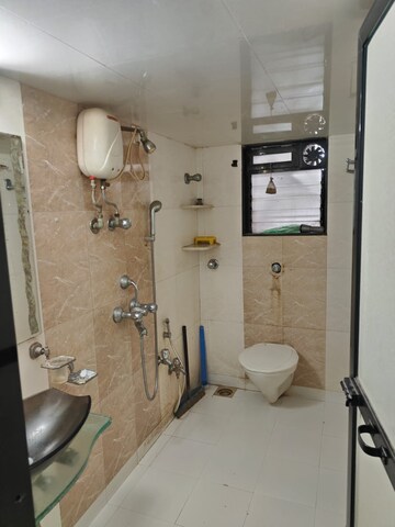 Bathroom in 2 BHK Apartment at Ramdev AMI Drashti, Dahisar East – for Rent