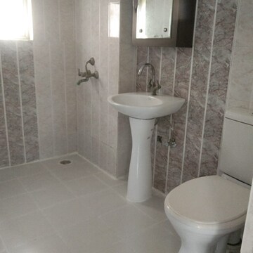 Bathroom in 3 BHK Apartment at Gardenia Golf City, Noida Central – for Rent