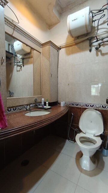 Bathroom in 3 BHK Builder Floor at Panchsheel Enclave – for Sale