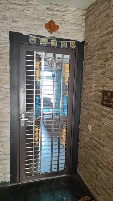 Building Lobby in 3 BHK Apartment at SVP Gulmohur Garden, Raj Nagar Extension – for Rent