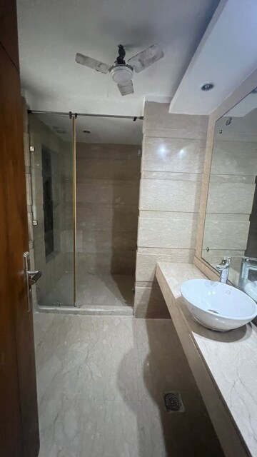 Bathroom in 4 BHK Builder Floor at Maharani Bagh – for Rent