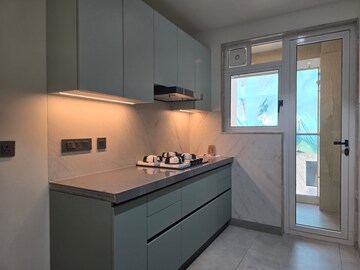 Kitchen in 2 BHK Apartment at Cassias Apartment, Bandra West – for Rent