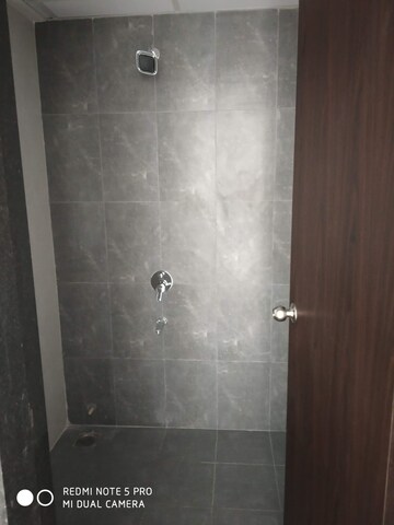 Bathroom in 1 BHK Apartment at Shapoorji Pallonji Joyville Hinjewadi, Hinjewadi – for Sale