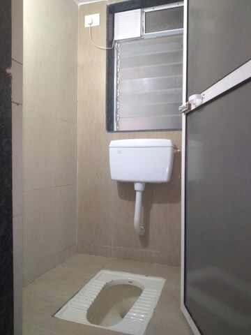 Bathroom in 1 BHK Apartment at Dudhwala Ayan Residency Phase 1, Morya Nagar – for Rent