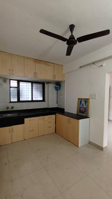 Kitchen in 2 BHK Apartment at Treasure Society, Pimple Gurav – for Sale