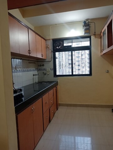 Kitchen in 2 BHK Apartment at Shree Vallabh Tower, Malad West – for Rent