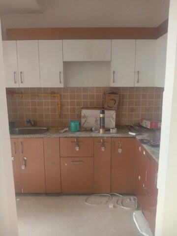 Kitchen in 3 BHK Apartment at Mahagun Mywoods, Sector 16c Greater Noida – for Rent