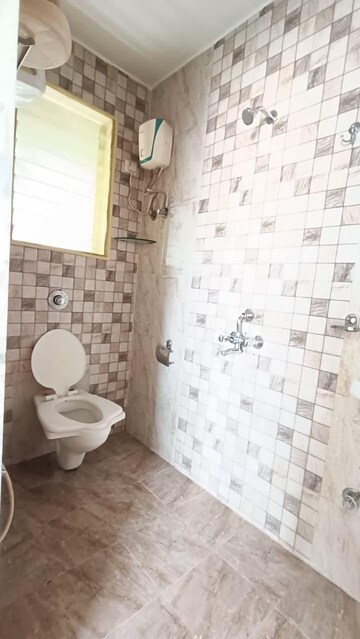 Bathroom in 2 BHK Apartment at Jangid Galaxy, Ghodbunder Road – for Rent